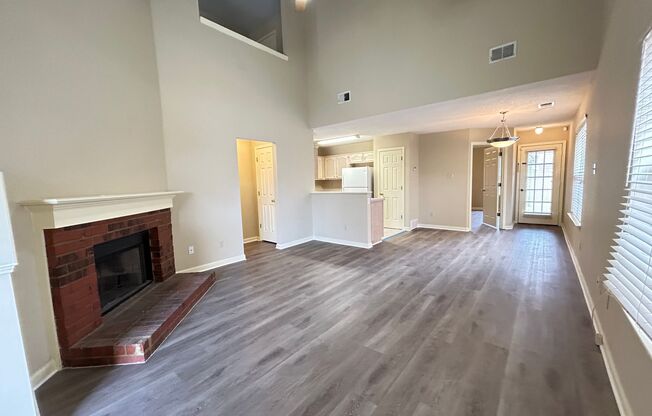 3BD/2.5BA Townhome with fully fenced back yard! Newer Paint! Newer Flooring!