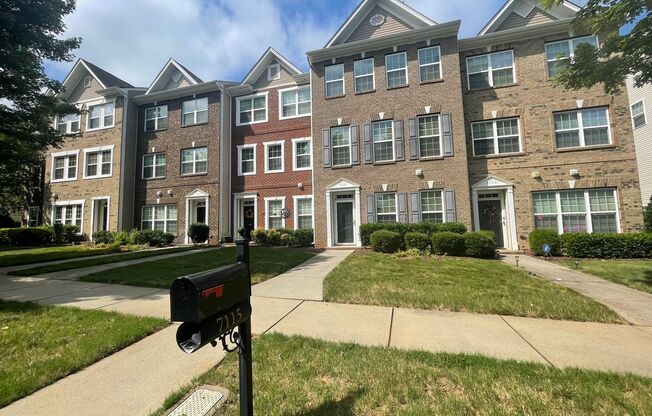 This Stunningly Tri-Level Town Home is Located in the Prestigious and Illustrious Brighton Park Community in Mint Hill, NC