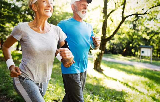 elderly couple jogging