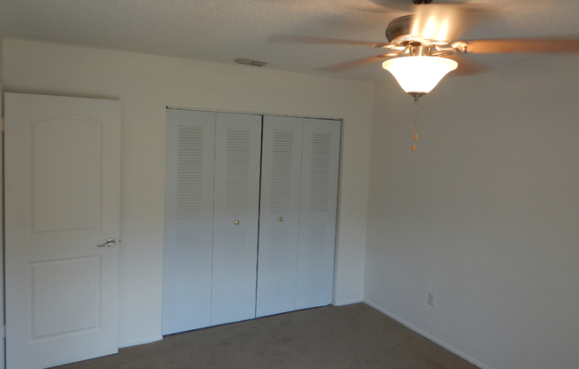 a large white refrigerator in a room