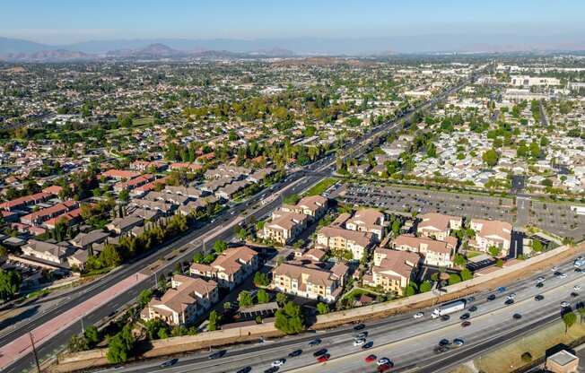 an aerial view of the freeway and suburbs