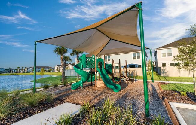 A lakeside play area at Amavi Kissimmee offers a relaxed outdoor spot right within our community.