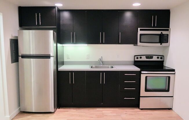 Experience the best of Seattle living at 2111 N 63rd in the sought out neighborhood of Greenlake!