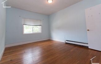 Large 5 Bedroom Unit in Brookline. Steps from the T Stop. Parking Included. Laundry is on the Site