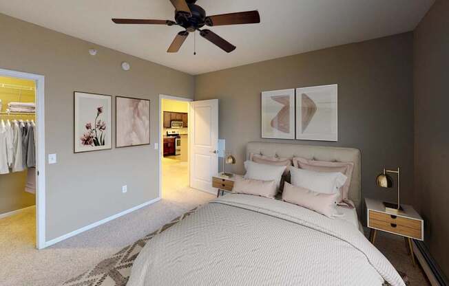 Bedroom With Ceiling Fan at The Ponds at Heritage Place, Minnesota
