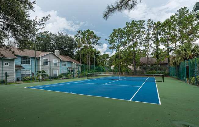 the tennis court at the preserve at ballantyne commons apartments