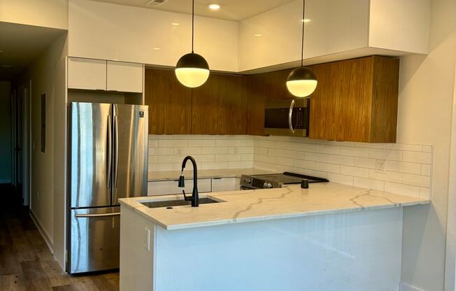 2 beds, 2 baths, 907 sqft, $1,850, Unit 207