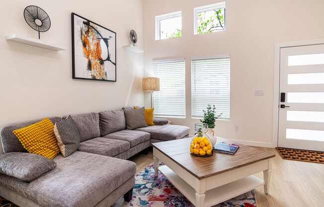 Spacious 3BR/3BA home in a quiet neighborhood near downtown and beaches, featuring private baths, outdoor seating areas, fenced yard, and modern comforts—perfect for short or long-term stays.