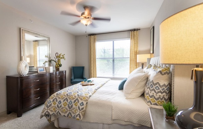This is a photo of the bedroom in the 826 square foot 1 bedroom , 1 bath apartment at The Brownstones Townhome Apartments in Dallas, TX.