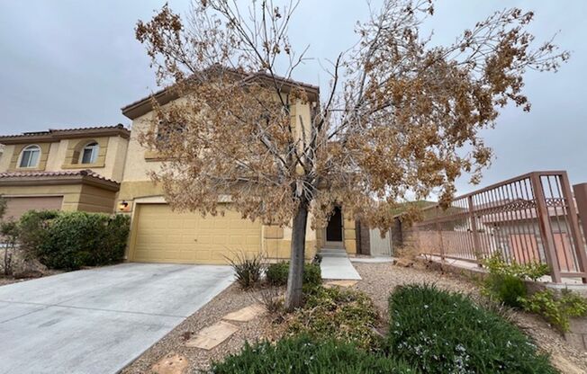 beautiful 2-story Home is in a guard-gated community in the Rhoads Ranch area