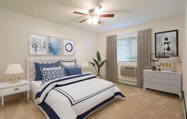 a bedroom with a bed and desk in a room