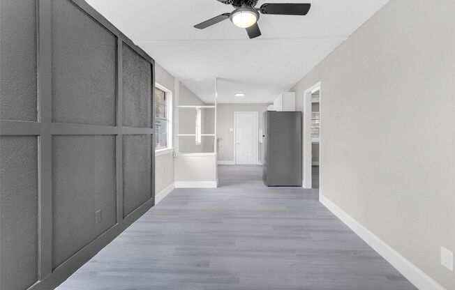 This beautifully remodeled duplex offers modern comfort and style with its two spacious bedrooms and one sleek bathroom. The updated interior features fresh paint, contemporary fixtures, and elegant flooring that complements the open floor plan. The kitch