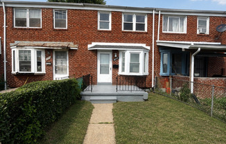 Dundalk Townhome with Finished Lower Level and Fenced Yard