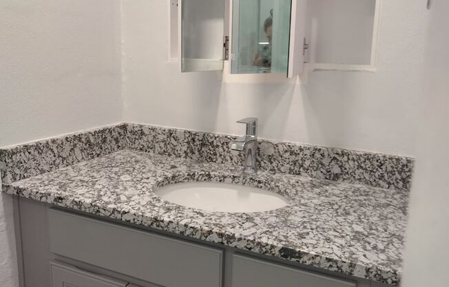 Remodeled 2/1 duplex with carport