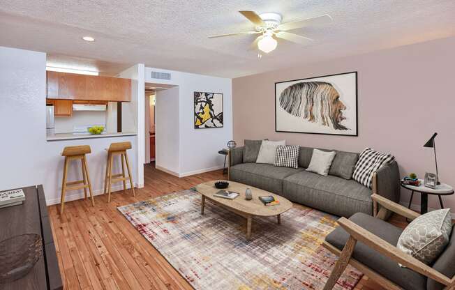 a living room with a couch and a table