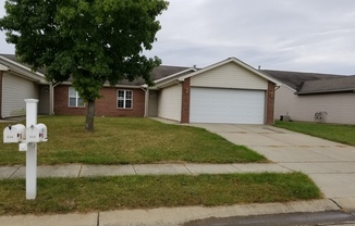 Beautiful 3 BD 2BA duplex with pond view and 2 car attached garage