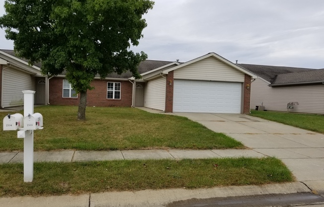 Beautiful 3 BD 2BA duplex with pond view and 2 car attached garage