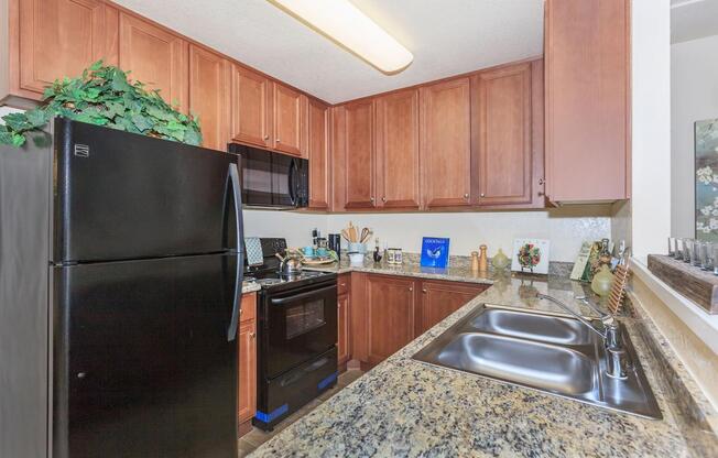 a stainless steel refrigerator in a kitchen