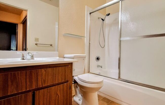 Spacious 2bd First Floor Condo W/Private Patio, Attached Garage, & Private Laundry Room