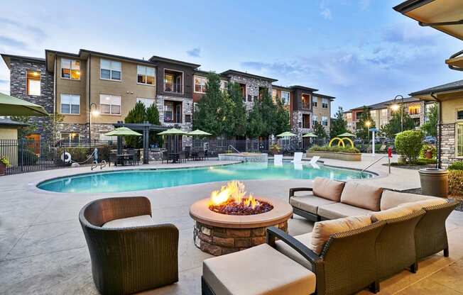 Acadia at Cornerstar Apartments - Poolside fire pit