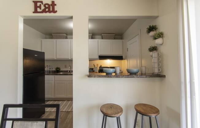 This is a photo of the breakfast bar in the 740 square foot 1 bedroom model apartment at Compton Lake Apartments in Mt. Healthy, OH.