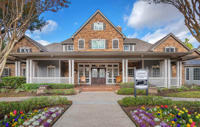 Lodge at Cypresswood Apartments - Leasing office entrance