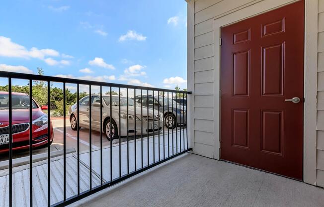 a double door on the side of a fence