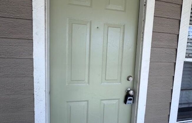 Second floor, 2/2 unit with wooded view near UCF