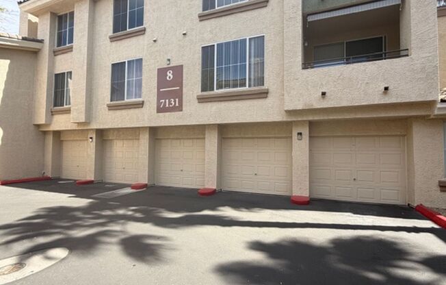 GUARD GATED TOP FLOOR PRIVATE 1 BED CONDO FEATURING A DETACHED 1 CAR GARAGE