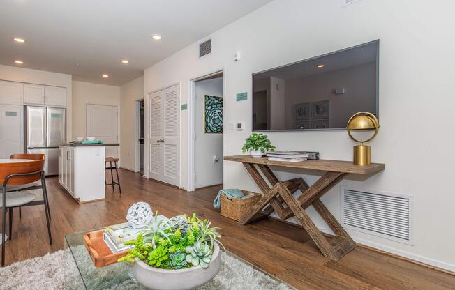 a living room filled with furniture and a table