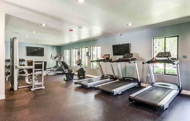 fitness center with treadmills