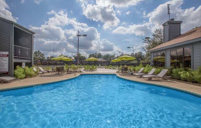 Swimming Pool with Lounge Chairs at Westside Flats, Houston, 77077