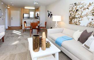 a living room with a couch and a table