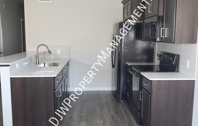 324 NE 3 ST