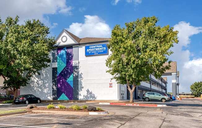 an office building with a mural on the side of it