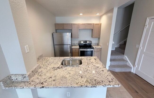 3 bed 2 bath Townhome in Resort Style Community Near The Loop