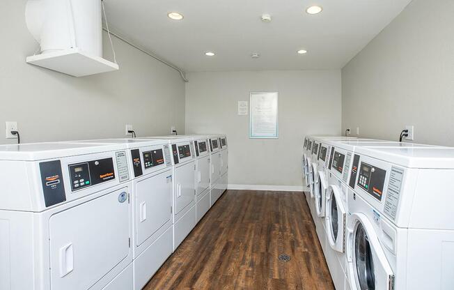 a stove top oven sitting inside of a kitchen