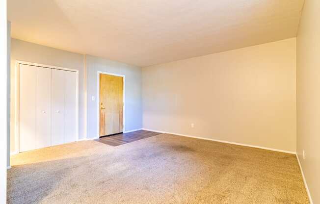 Carpeted interior entryway of unit