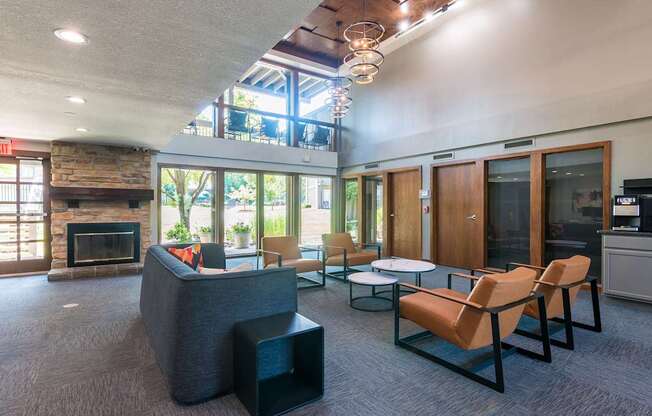 A modern living room with a fireplace and a couch.