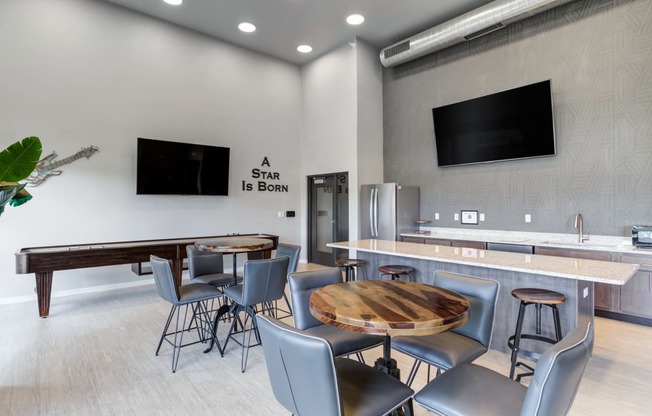 Sky Lounge with shuffleboard & kitchen with bar