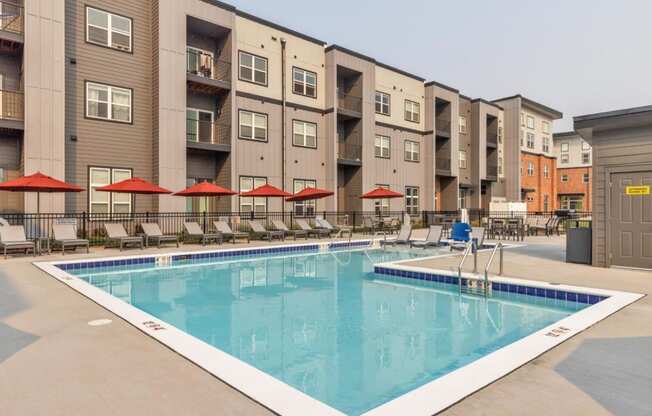 The Edison at Bozeman Gateway Apartments in Bozeman, Montana Pool with Lounge Chairs