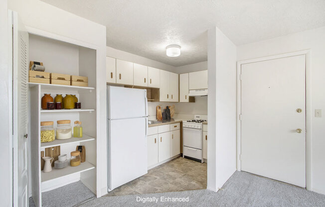 studio kitchen with ample closet space at Seville Apartments in Kalamazoo, MI 49009