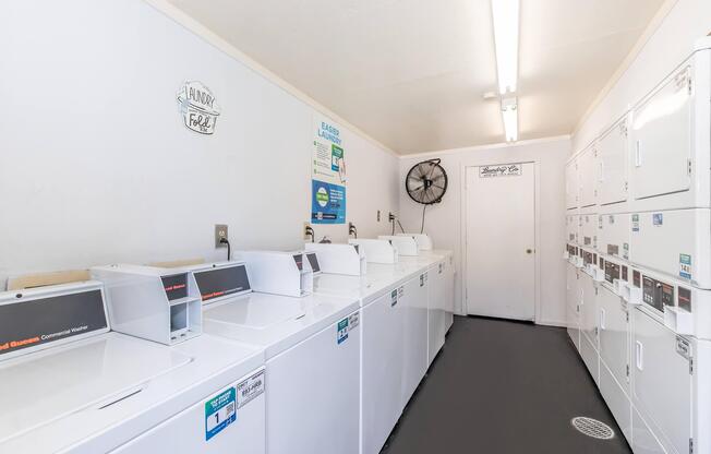 a kitchen with a sink and a refrigerator