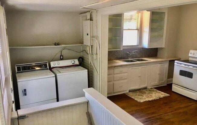 Charming 2 Bd Farmhouse on 1.12 Acres Within City Limits