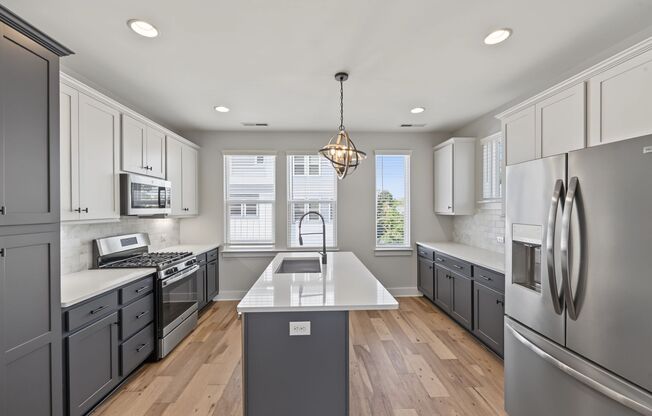 Modern 4-Story Townhome with Private Rooftop Terrace & 2-Car Garage