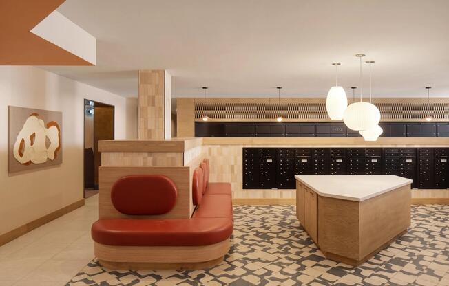 A thoughtfully designed mail lounge with warm finishes and modern lighting—every detail considered at Modera Rio Salado.