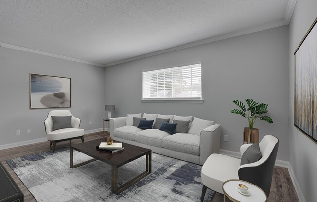 Step into modern elegance at Icon Downtown Durham. This stylish living space features sleek furniture, ample natural light, and a cozy atmosphere perfect for relaxation. Elevate your lifestyle today—schedule your tour now!