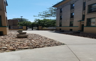 Experience serenity in this charming courtyard, perfect for peaceful relaxation.