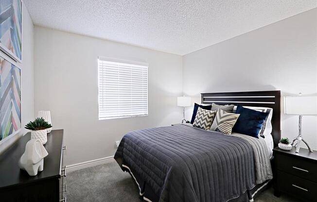 Spacious Bedroom With Comfortable Bed at Villatree Apartments, Tempe, Arizona