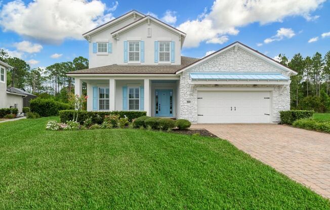 Welcome Home to this beautifully designed home located in the prestigious gated community of Coastal Oaks in Ponte Vedra
